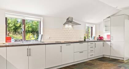 Spacious Teifi Valley barn for holidays near the Cardigan coast.