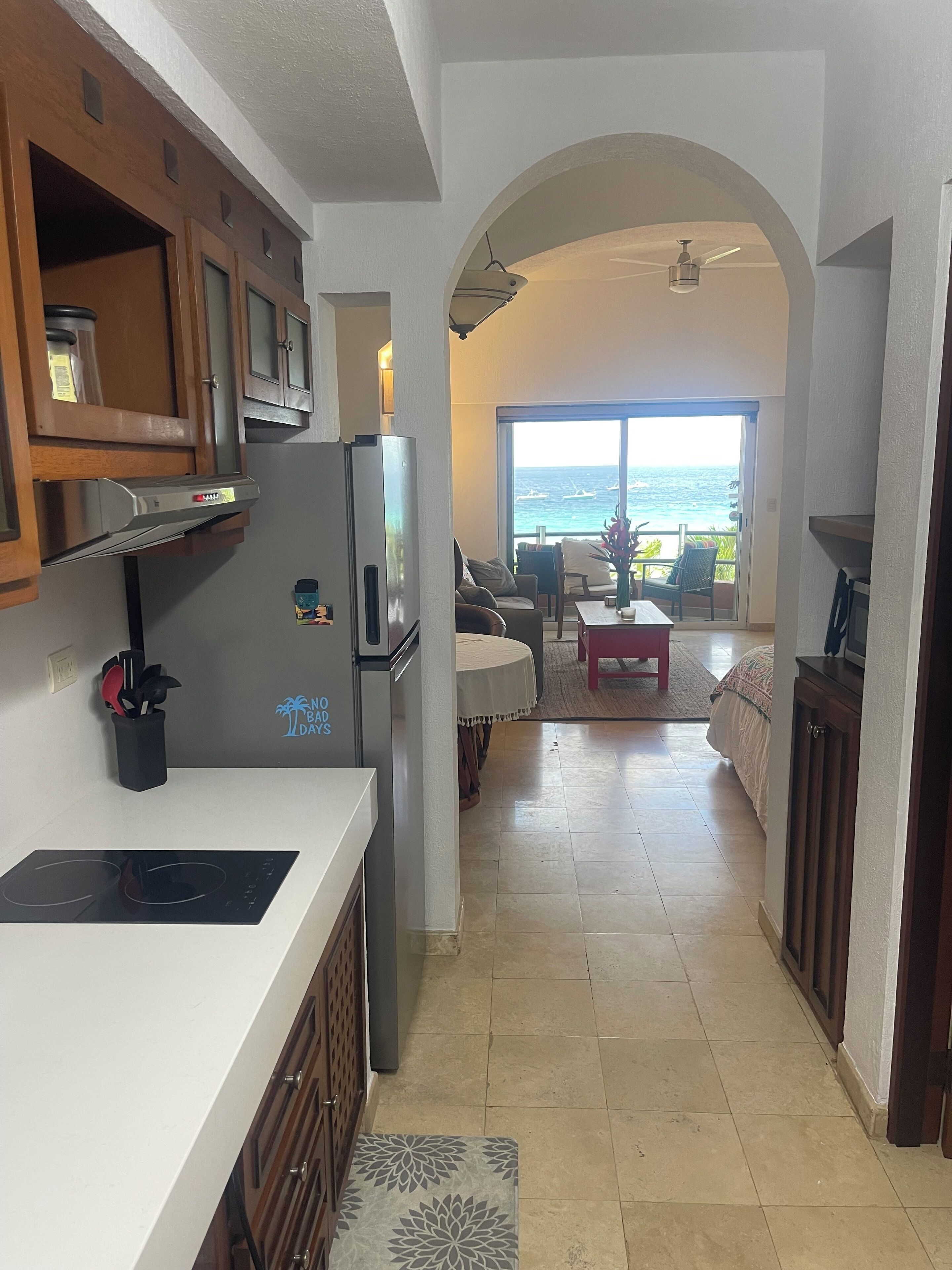 Fridge, microwave, stovetop, coffee/tea maker