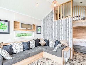 Living area - Superb pods ideal for a family break close to the coast. (Chapel St Leonards)