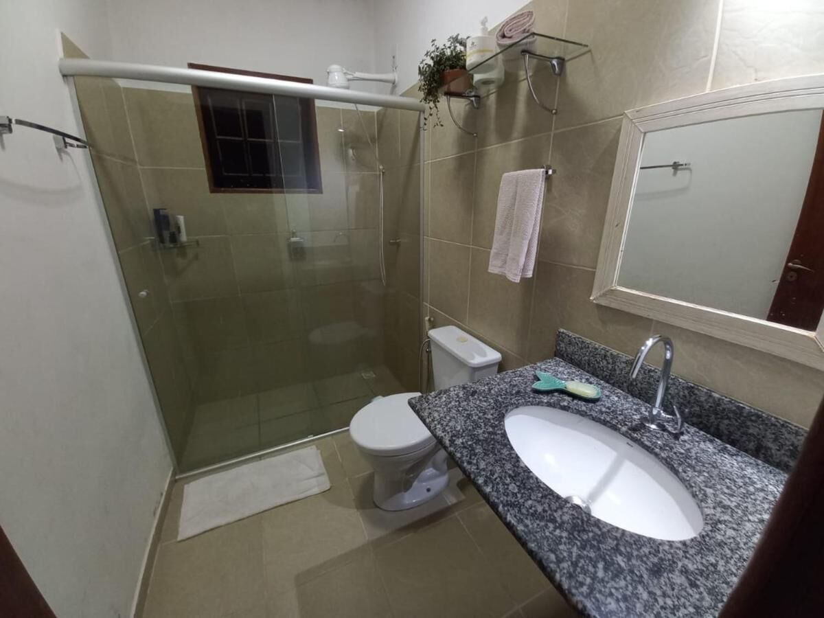 Casa família | Banheiro | Chuveiro, toalhas de banho