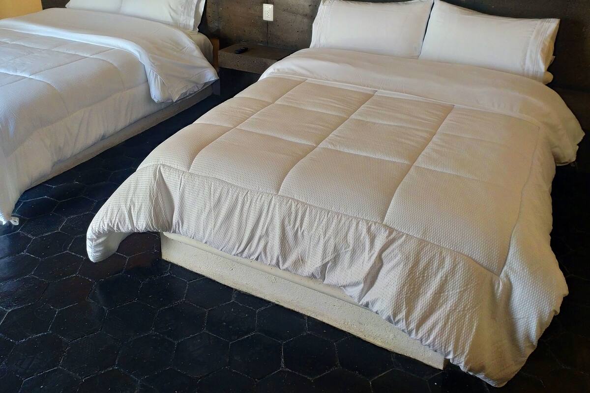 Habitación cuádruple tradicional, varias habitaciones | 2 habitaciones, wifi gratis y ropa de cama