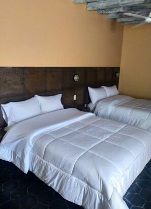 Traditional Quadruple Room, Multiple Bedrooms | Free WiFi, bed sheets - Hotel Oxi (San Miguel de Allende)