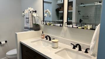 Shower, hair dryer, towels, soap