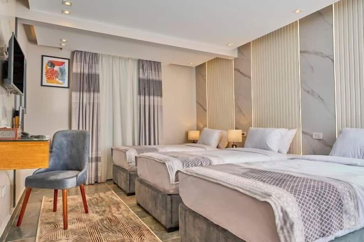 2 habitaciones, ropa de cama de alta calidad y edredón