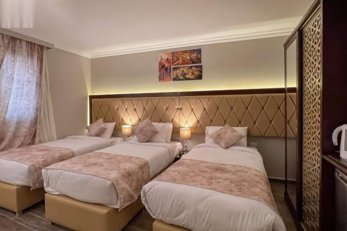 2 habitaciones, ropa de cama de alta calidad y edredón