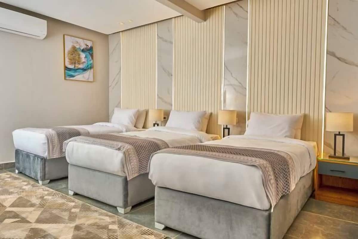 2 habitaciones, ropa de cama de alta calidad y edredón