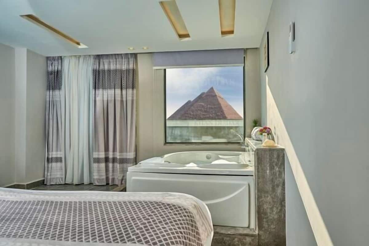 2 habitaciones, ropa de cama de alta calidad y edredón
