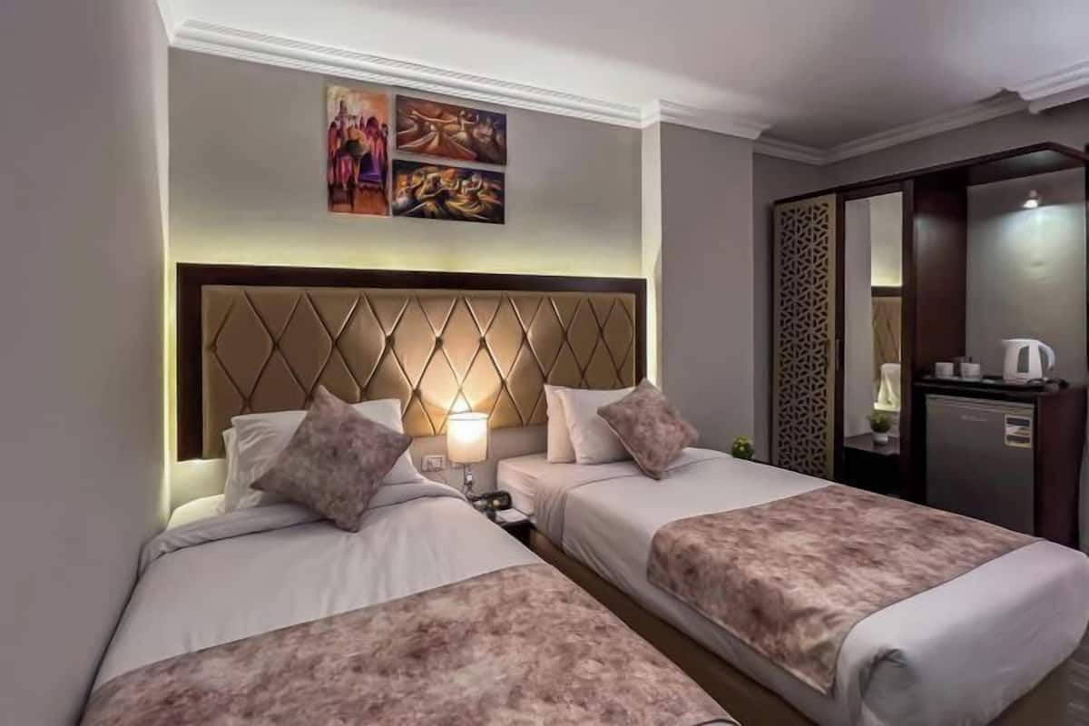 2 habitaciones, ropa de cama de alta calidad y edredón