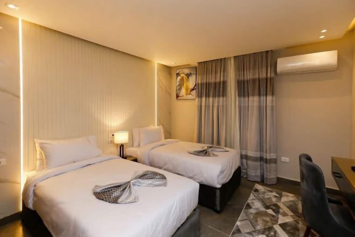 2 habitaciones, ropa de cama de alta calidad y edredón