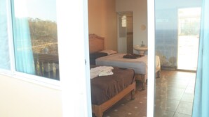 Family Double Room, 2 Queen Beds | Terrace/patio