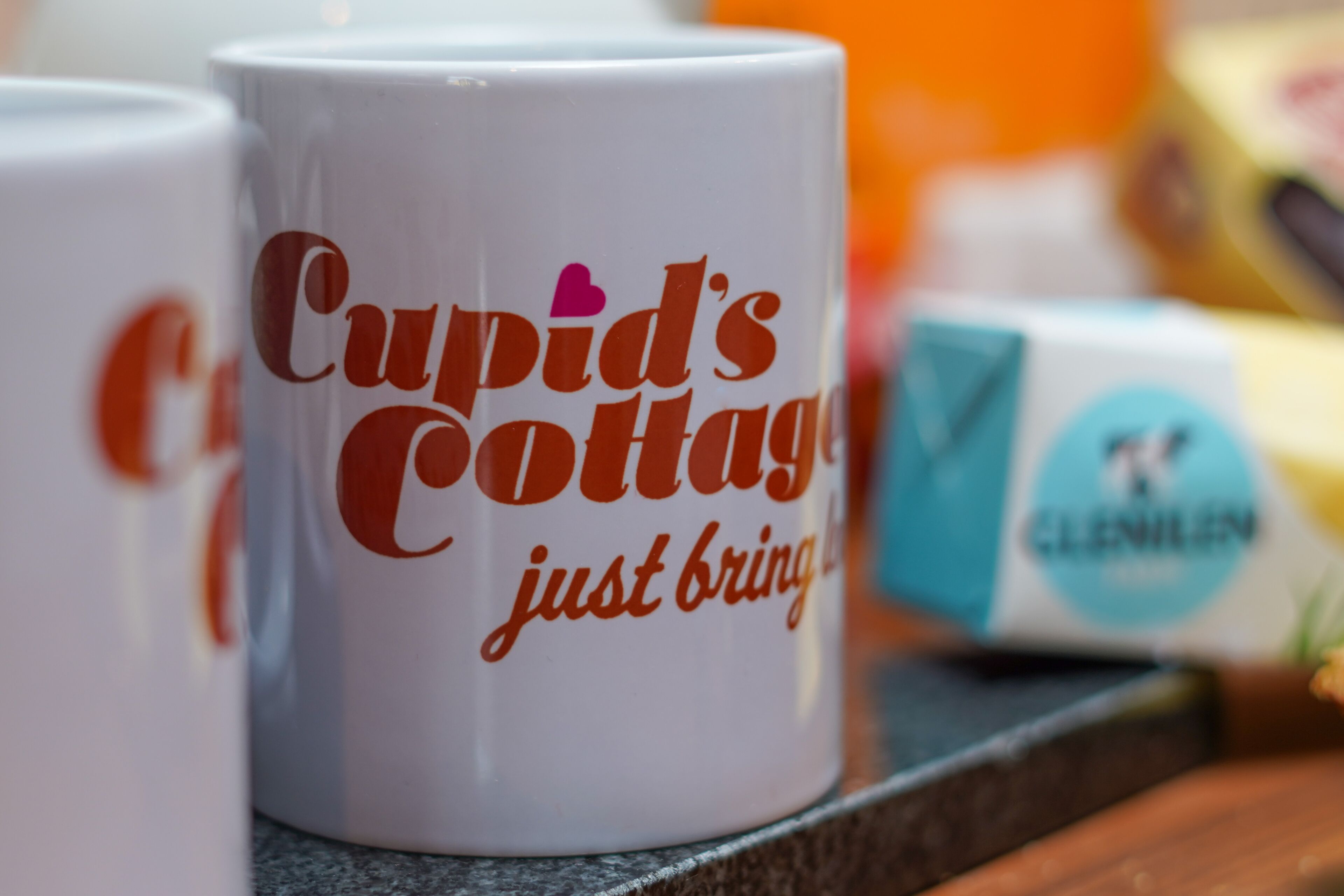 A white mug with text.