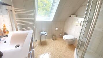 Een douche, handdoeken