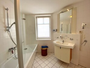 Shower, hair dryer, towels