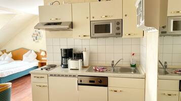 KylskÄp, mikrovÄgsugn, spishÀll och diskmaskin