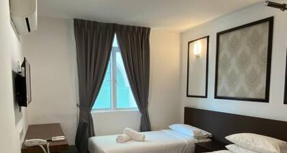 Cafe & Capital O 90756 Cara Hulu Hotel