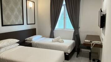 Deluxe Twin Room | Down comforters, desk, laptop workspace, bed sheets
