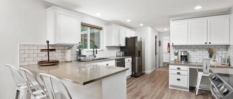 Fridge, microwave, dishwasher, coffee/tea maker