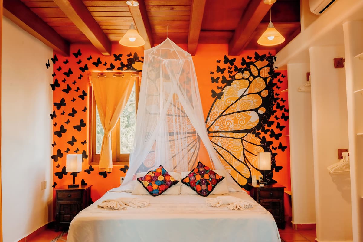 Mariposa Multi bed Suite | Premium bedding, pillow-top beds, laptop workspace, free WiFi