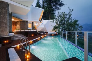 Outdoor pool, pool umbrellas, sun loungers