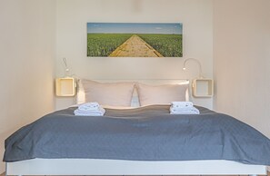 1 غرفة نوم ومكواة/لوح كي وواي فاي مجانًا وملاءات أسرّة