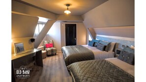 2 عدّة غرف نوم ومكواة/لوح كي وسرير سفر وواي فاي