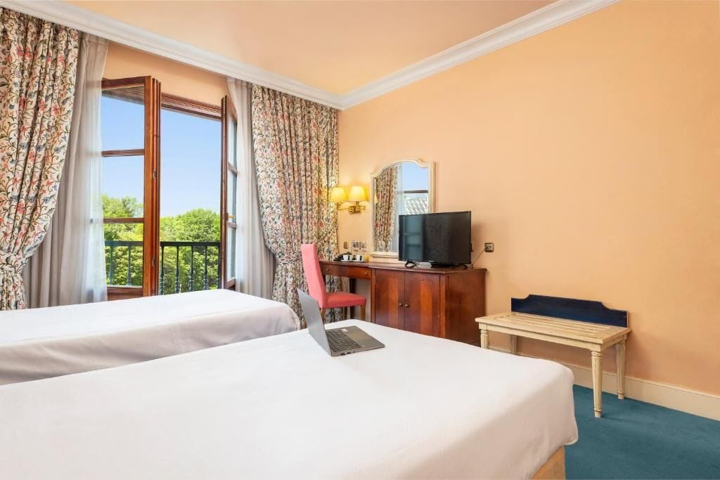 standard twin room | in-room safe, desk, blackout curtains, free wifi