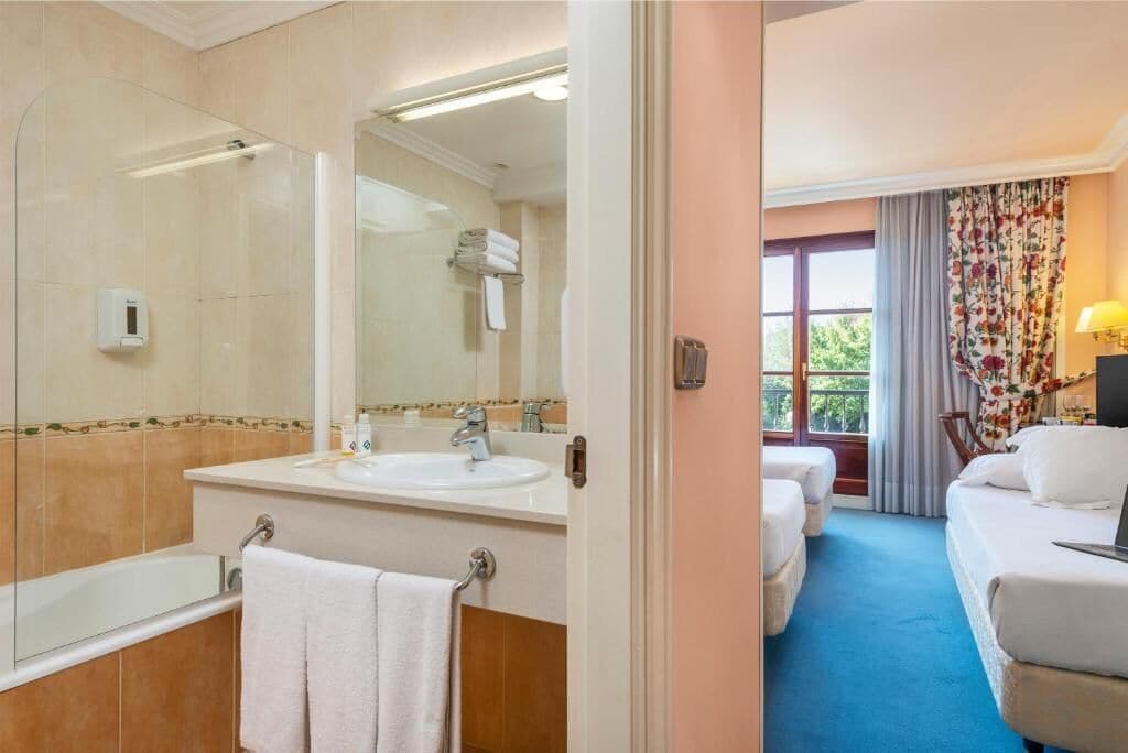 combined shower/bathtub, hair dryer, towels, soap