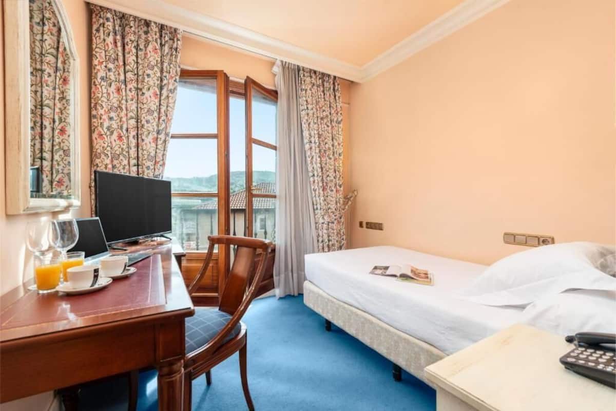 in-room safe, desk, blackout curtains, free wifi