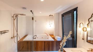 Royal Studio Suite | Bathroom | Designer toiletries, hair dryer, bathrobes, slippers