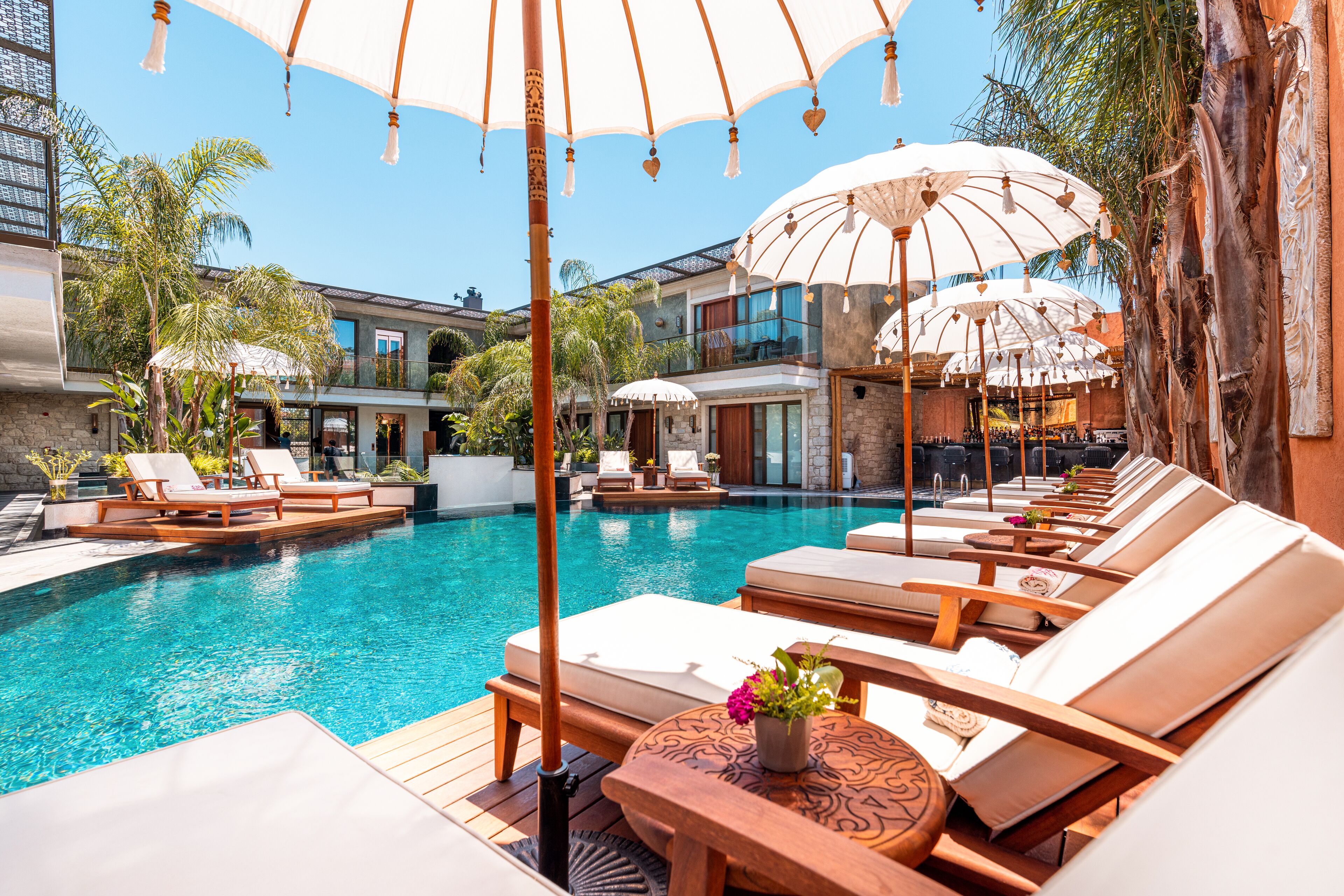 Outdoor pool, pool umbrellas, sun loungers