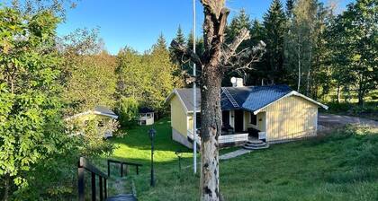 The house BjÀrkhult modern renovated with boat in typical Swedish quiet location