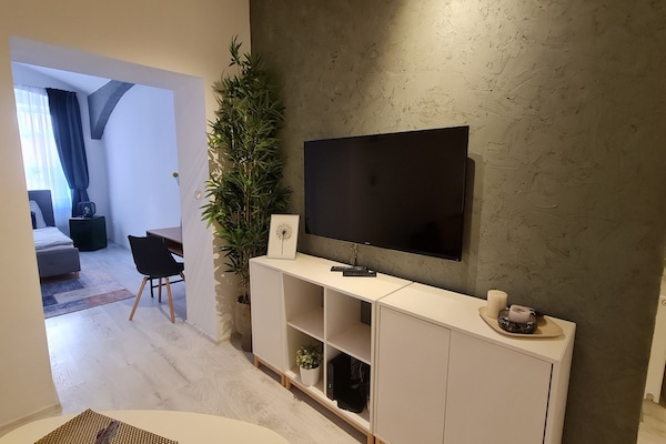 Apartamento urbano, 1 quarto, cozinha americana | 1 quarto, cortinas blackout, ferros/tábuas de passar roupa