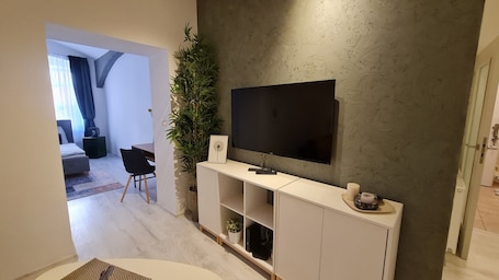 Apartamento urbano, 1 quarto, cozinha americana | 1 quarto, cortinas blackout, ferros/tábuas de passar roupa. Apartment near Congress Centre I.