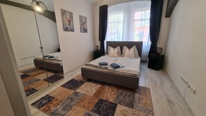 Lägenhet City - 1 sovrum - pentry | 1 sovrum, mörkläggningsgardiner, strykjärn/strykbräda och gratis wi-fi