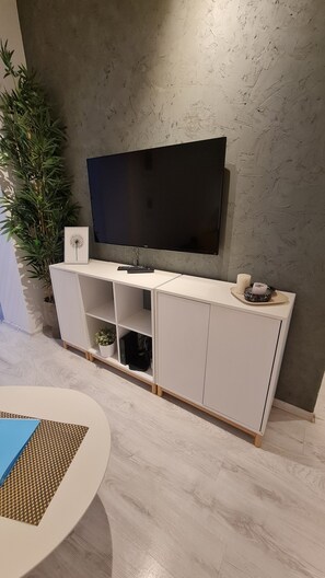 Apartamento City, 1 habitación, cocina básica | 1 dormitorio, cortinas opacas, tabla de planchar con plancha