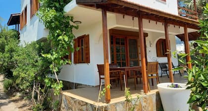 Cosy villa in a big mandarin garden close to seaside