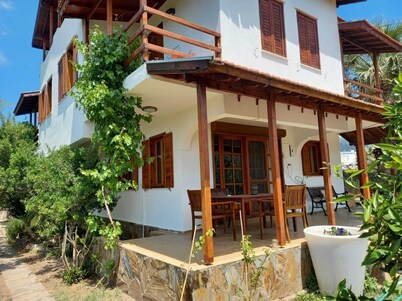 Cosy villa in a big mandarin garden close to seaside