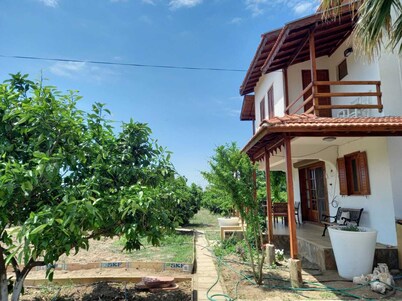 Cosy villa in a big mandarin garden close to seaside