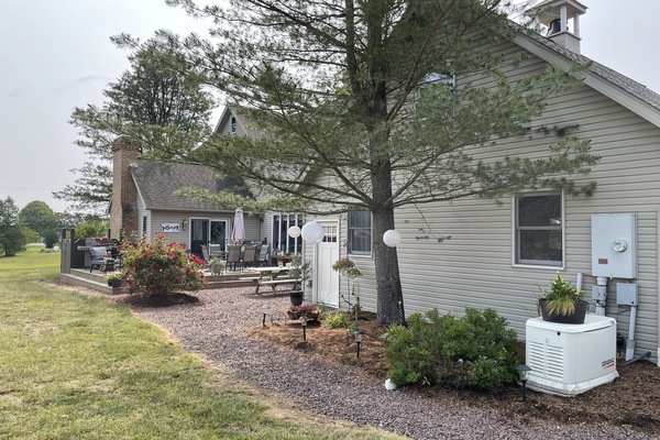 The back of our home and the entrance to the apartment