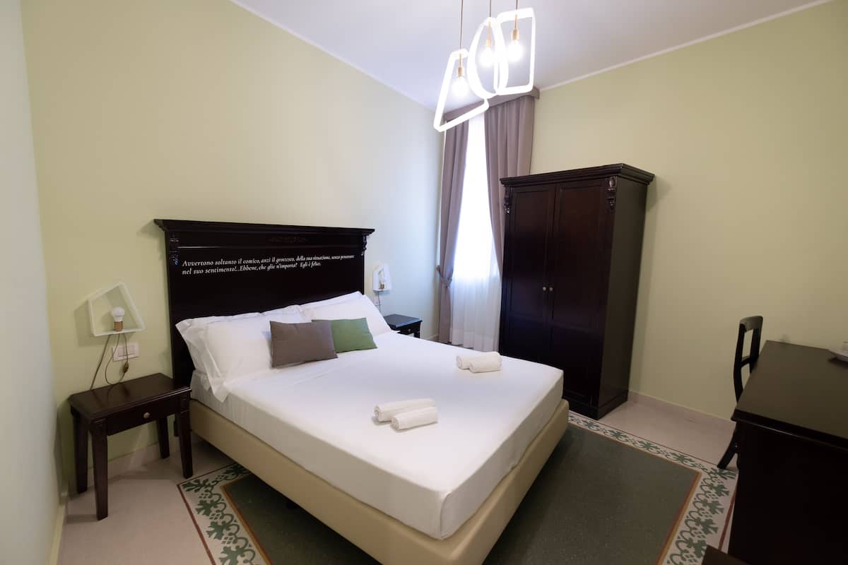 Standaard kamer, 1 twee- of 2 eenpersoonsbedden | 1 slaapkamer, een minibar, individueel gedecoreerd