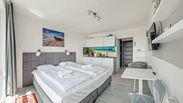 Suite estudio (26) | Tabla de planchar con plancha, wifi gratis y ropa de cama