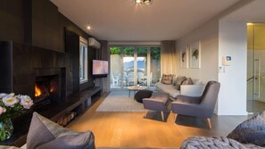 TV, fireplace, books, offices