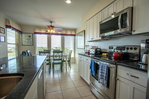 Condo, Multiple Beds, Patio, Ocean View | Private kitchen | Fridge, microwave, oven, stovetop