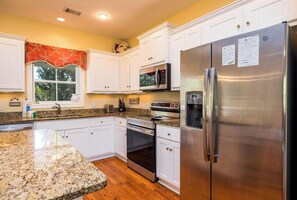 บ้านพัก, หลายเตียง, ห้องครัว, วิวสวน | ครัวส่วนตัว | เครื่องชงกาแฟ/ชา