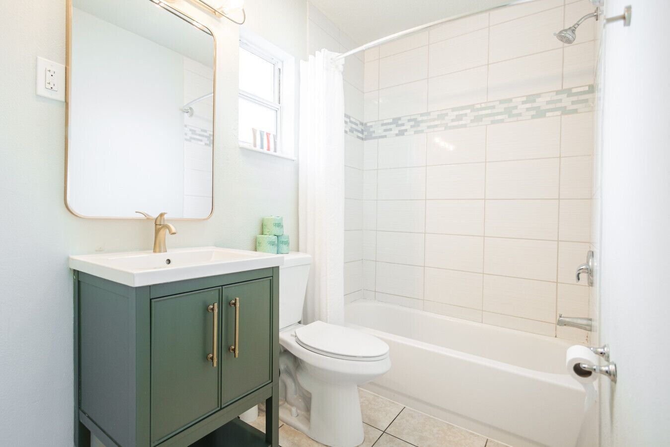 Shower, hair dryer, towels, shampoo