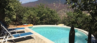 A beautiful loft in nature but close to the city, with pool /streamer