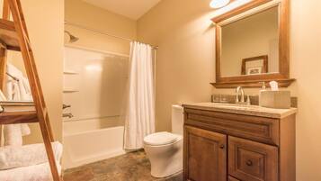 Combined shower/tub, towels, soap, toilet paper