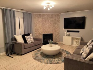 Smart TV, fireplace, books