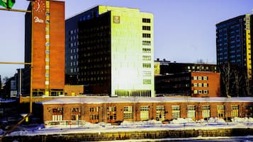 Hotel Diös features a modern design with a mix of brick and glass facades.