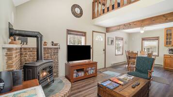 Smart TV, fireplace, DVD player, books